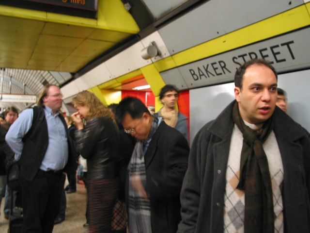 Ethan, Fred and others awaiting the train to Canary Wharf for the Global Voices 2005 Summit in London.