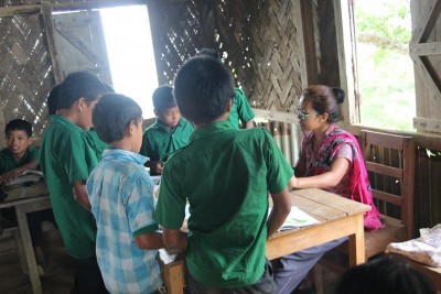 Teacher Sangpui Rose Merry Lusai is teaching some students of an individual class at School.                           Picture by : Suman Chowdhury Mony